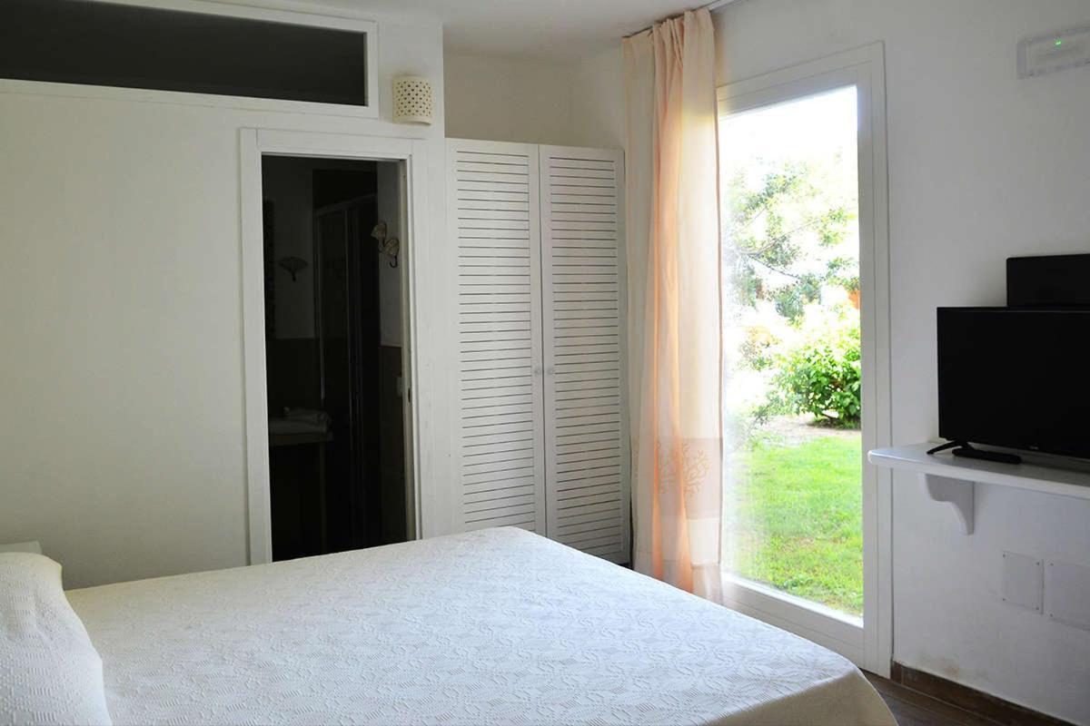 Hotel Porto Pino Club Esterno foto