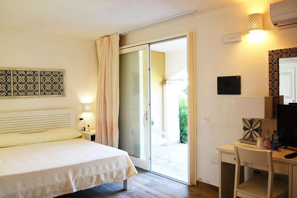 Hotel Porto Pino Club Esterno foto