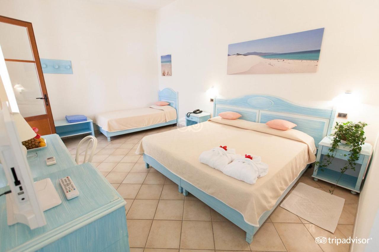 Hotel Porto Pino Club Esterno foto