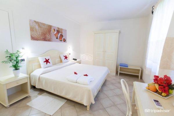 Hotel Porto Pino Club Esterno foto