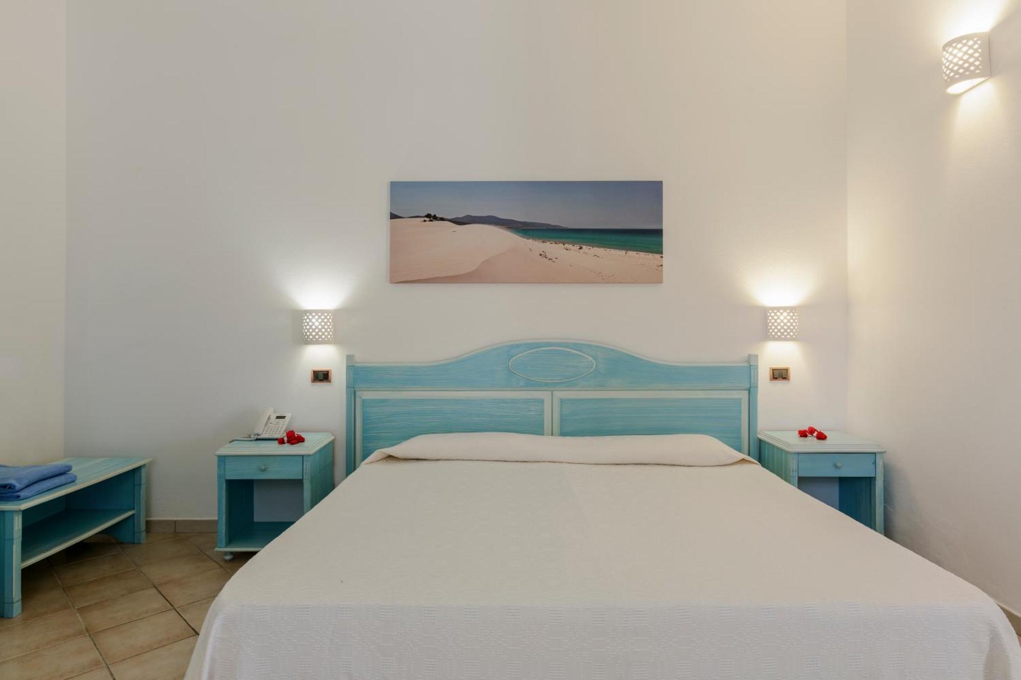 Hotel Porto Pino Club Esterno foto